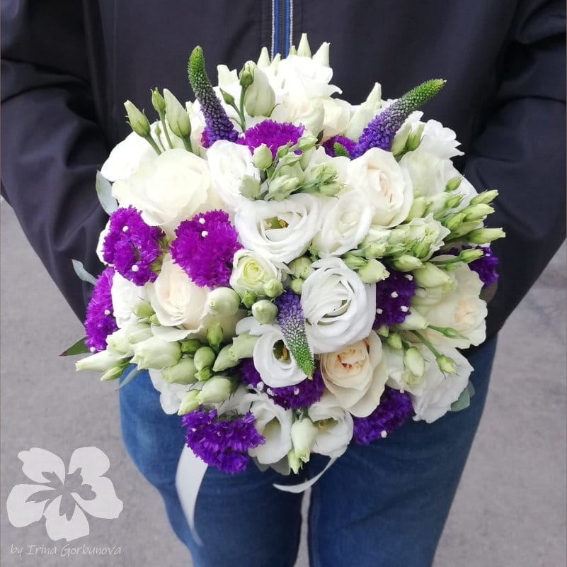 White and purple bride’s bouquet