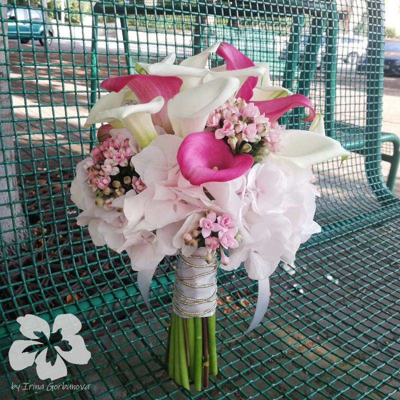Pink wedding bouquet with calla lilies