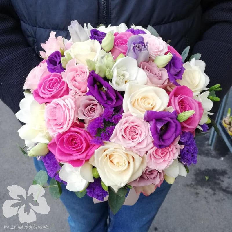 White, pink and purple bride’s bouquet